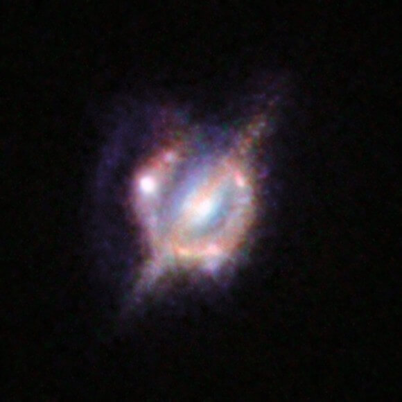 H-ATLAS J142935.3-002836 - An object in the distant universe consisting of two colliding galaxies. Combined photography: the Hubble Space Telescope and the ground telescopes Keck, Alma and the Very Large Array