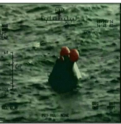 First clear photo of Orion in the waters of the Pacific Ocean, about a thousand km east of the Baja California peninsula from one of the helicopters. Screenshot from NASA TV