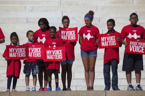 A demonstration against voting rights restrictions for blacks in the US on the 50th anniversary of the Martin Luther King Jr. March. American Spirit / Shutterstock.com