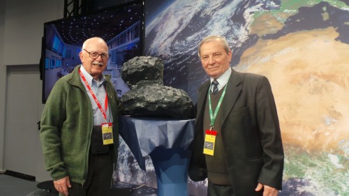 Sam Golkis (left) and Kalim Churiomov from the Comet Explorers at the event in honor of the landing of Philae. In the background, a model of the comet. Photo: Avi Blizovsky