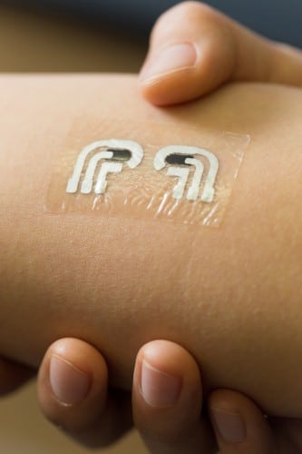 A tattoo-like sticker for monitoring blood sugar. Photo: American Chemical Society.