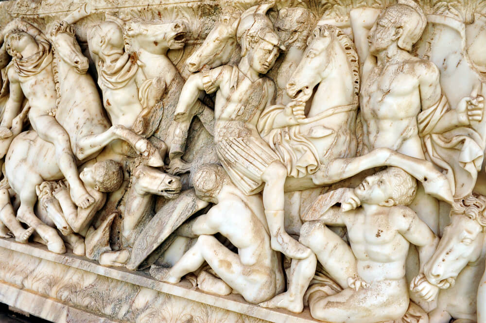 A depiction of Hellenistic soldiers fighting barbarians on a coffin discovered in Ashkelon in 2009. Photo: ChameleonsEye / Shutterstock.com