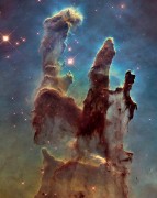 אסטרונומים השתמשו בטלסקופ החלל האבל כדי לצלם תמונה חדה וגדולה יותר של ערפילית הנשר – "עמודי הבריאה". צילום:NASA/ESA/Hubble Heritage Team (STScI/AURA)/J. Hester, P. Scowen (Arizona State U.)