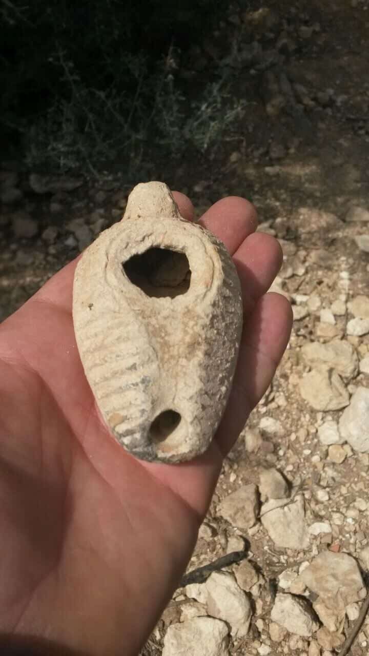 The photo of the clay candle that was uncovered during the digging of the hole. Photo: The Robbery Prevention Unit at the Antiquities Authority