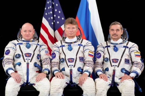 Members of the International Space Station's 43rd crew take a break from training for a group photo. From the left, Scott Kelly from NASA, Gandy Padalka and Mikhail Kurinenko from the Russian space agency Roscosmos. Kelly and Kurinenko will spend a whole year on the space station. Photo: Image Credit: Roscosmos/GCTC