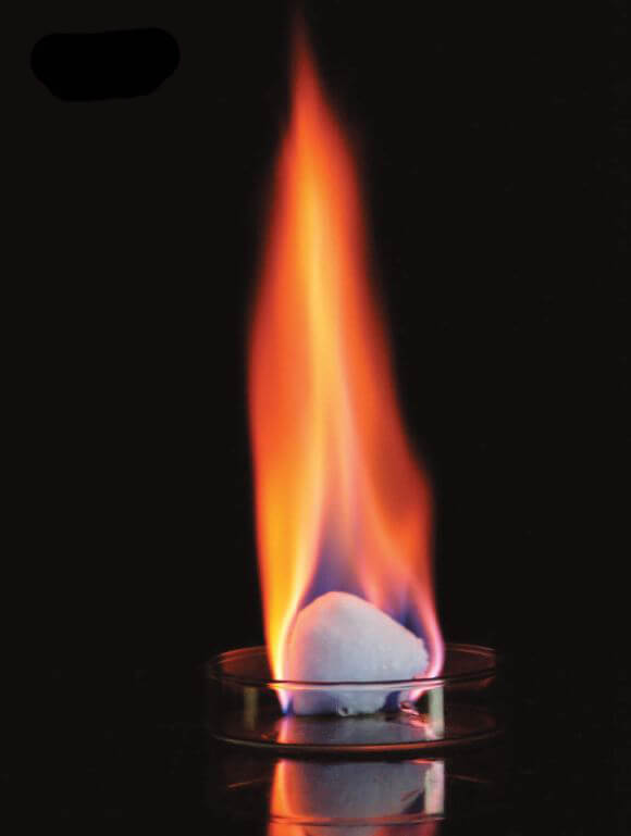 An artificial block of methane hydrate burns easily in open air (MH21 Research Consortium)