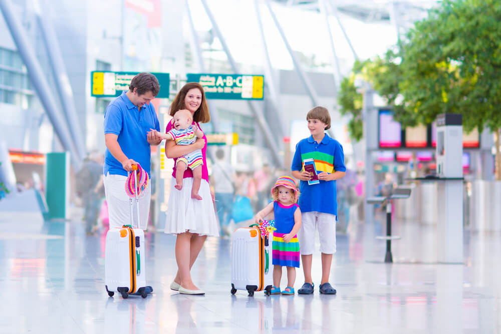 A family in the airport terminal in Dusseldorf Germany. Photo: shutterstock