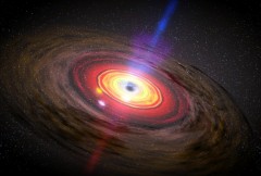 גרעין גלקטי פעיל וסילוני זרם היוצאים מהחור השחור שבמרכזו. NASA / Dana Berry / SkyWorks Digital