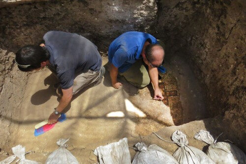 One of the burial mounds is being cleaned. Photo: Dan Shahar, courtesy of the Antiquities Authority