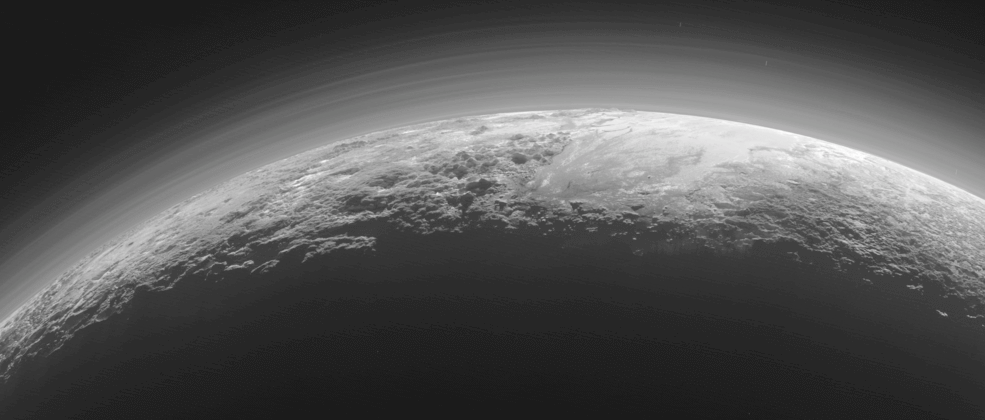 Pluto's majestic mountains, icy plains and misty haze as photographed just 15 minutes after New Horizons' closest approach to Pluto on July 14, 2015. Photo: NASA / JHUAPL / SwRI