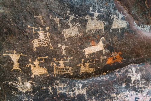 The historic cow murals depicting a hunting expedition, near Bhopal in India. Photo: shutterstock