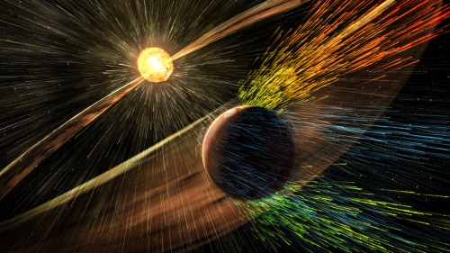 An artist's rendering of solar storms hitting Mars and blasting ions from the upper atmosphere. Image: NASA/GSFC