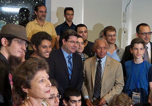 NASA head Charles Bolden, science minister Ofir Akunis, and Givatayim mayor Ran Konik with children and teachers at the city's observatory. Photo: Avi Blizovsky