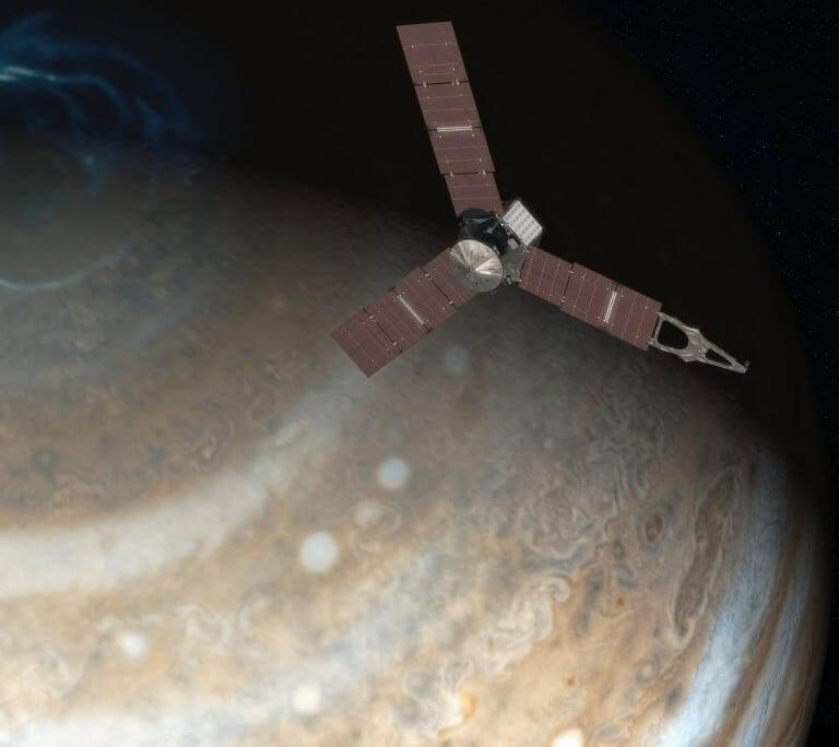 The Juno spacecraft hovers over Jupiter. Image: NASA