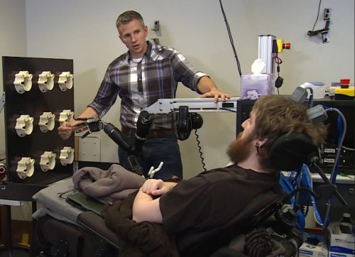 Restoring sensation using a robotic arm. Photo: University of Pittsburgh