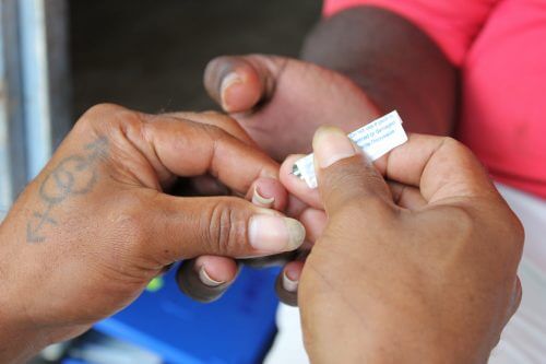 Photo from a malaria vaccination project in the Solomon Islands. Source: Jeremy Miller, AusAID, Department of Foreign Affairs and Trade, Flickr.