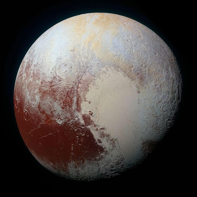 Pluto in a photograph with artificial color designed to highlight differences in its surface, taken by New Horizons on July 14, 2015. Source: NASA.