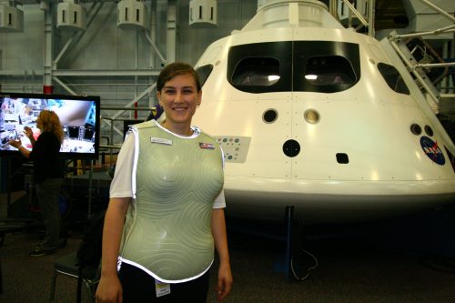 Demonstration of the Israeli StemRed radiation suit next to the model of NASA's Orion spacecraft. Photo: Oren Milstein