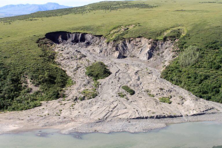 A particularly hot summer in Alaska in 2004 caused the collapse of the permafrost seen in the photograph. Source: NPS Climate Change Response.