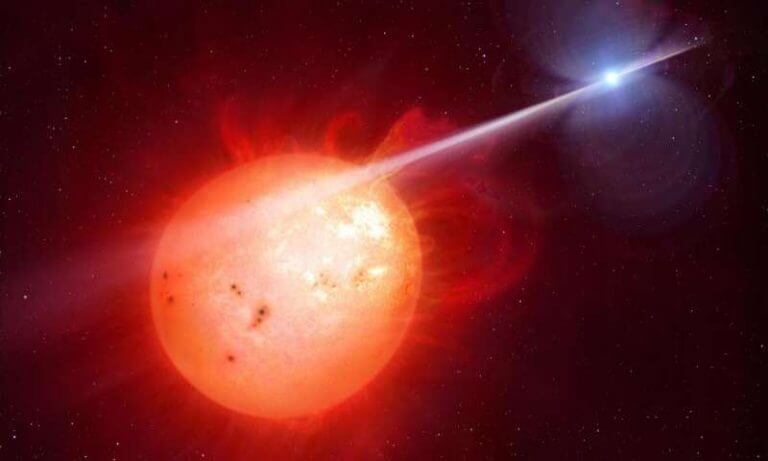 The double star system AR Scorpii, located 380 light years from Earth is an unusual system. The white dwarf that shoots a concentrated beam of electrons that hits every two minutes (its spin time) its neighbor in the system - a red dwarf. Illustration: University of Warwick.