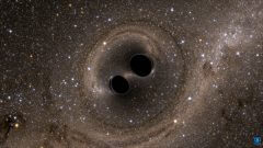 הדמייה של התמזגות שני חורים שחורים, שעל קיומה הצביעו גלי הכבידה שתועדו על ידי LIGO בשנת 2017. מקור: The SXS (Simulating eXtreme Spacetimes) Project.