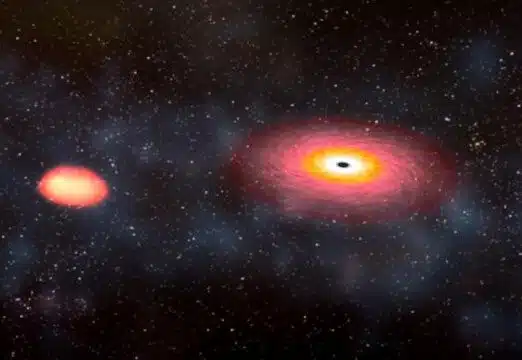 אילוסטרציה של כוכב נייטרונים וחור שחור מתמזגים. Credit: Dana Berry/NASA