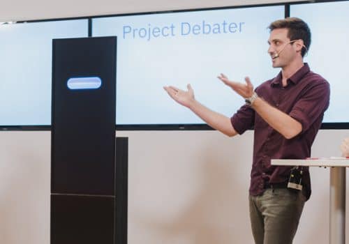 ער בך וה-Project Debater במהלך הוויכוח הלוהט. צילום: אור קפלן