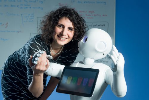 Dr. Sheli Levy-Tzedek, head of the Laboratory for Cognition, Aging and Rehabilitation together with the humanoid robot Pepper. Photo: Danny Machlis, Ben Gurion University