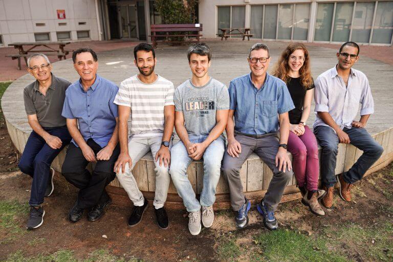 Sitting from right to left: Elhanan Magid, Dekla Oren, Prof. Erez Hasman, Arkady Fireman, Tomer Stav, Research Prof. Moti Segev and Dr. Vladimir Kleiner