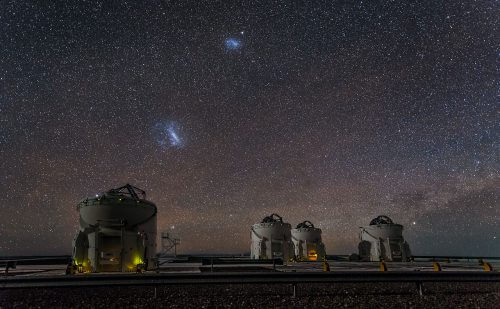 Photograph of the Small Magellanic Cloud and the Large Magellanic Cloud above the ESO (European Southern Observatory) observatory in Pernell, Chile. The telescopes in the picture are 1.8 meters in diameter and they are operated together with an 8.2 meter telescope and thereby create the most advanced optical observatory in the world - VLTI and it is able to photograph 25 times more clear details than each of the telescopes individually. Photo: ESO