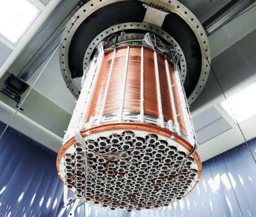 The heart of the detector in the XENON1T experiment. The copper rings shape the electric field used to transport the electrons