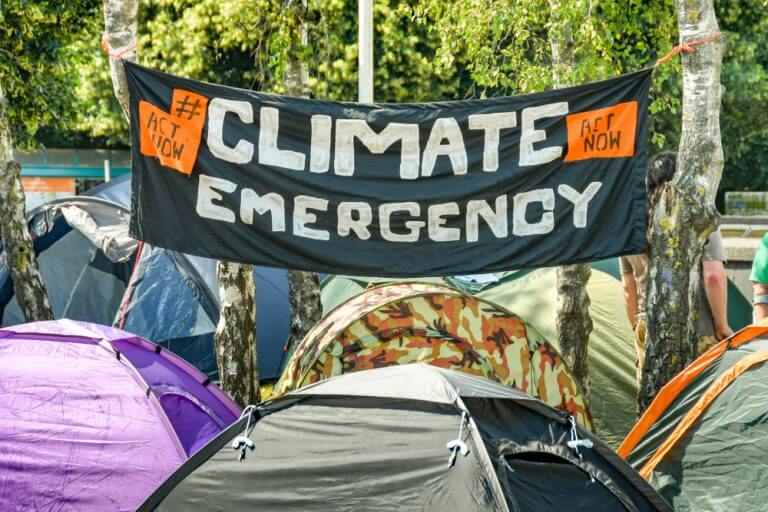 Cardiff, UK, July 2019: A sign reading 'Climate Emergency' displayed during an anti-climate change demonstration organized by the Extinction Rebellion movement. Photo: shutterstock.com