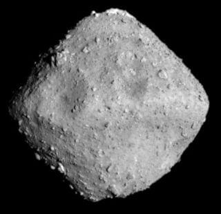 Asteroid Ryogo as photographed by the Yabusa 2 spacecraft. The dust has escaped into space.