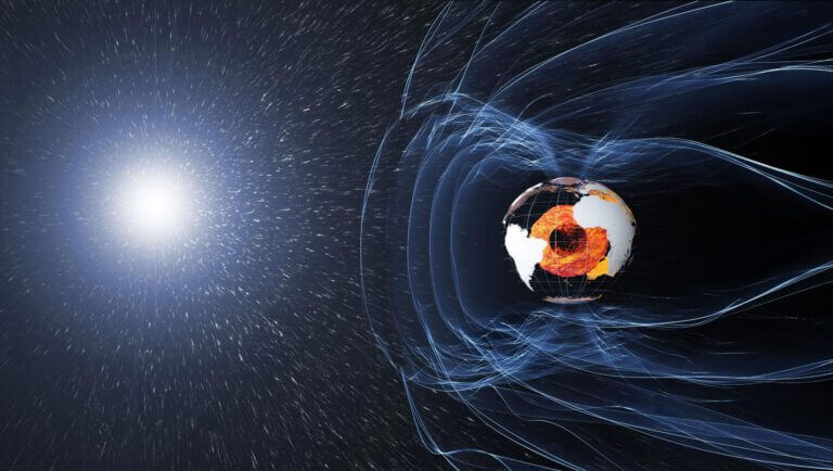 The magnetic field and electric currents in and around the Earth produce complex forces that have a huge impact on our day-to-day lives. One can imagine the field as a giant bubble, protecting us from space radiation and charged particles with which solar winds bombard the earth. Credit: ESA/ATG medialab