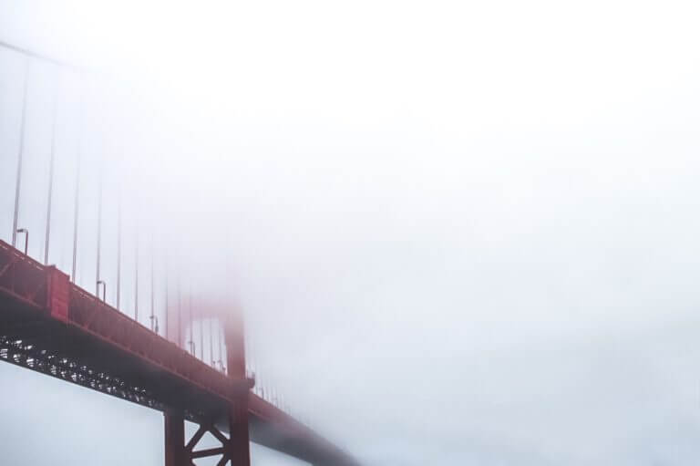 The Golden Bridge in San Francisco under a blanket of fog. Photo: aaron roth – unsplash