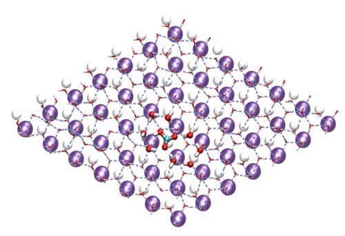 A top view of the ice structure formed near the surface of the silver iodide crystal (purple and white) used today for cloud seeding, including the hexagonal structure formed by the bicarbonate (turquoise and red) and water molecules (red and white)