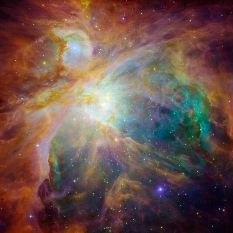 A composite image of the Orion Nebula, as seen by the Hubble Space Telescope and the Spitzer Space Telescope in observations made over many years. Credit: NASA/JPL-Caltech STScI