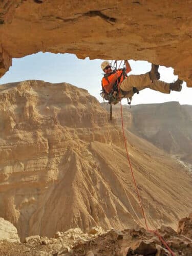 abseiling in the Judean Desert. Photo: Eitan Klein, Antiquities Authority