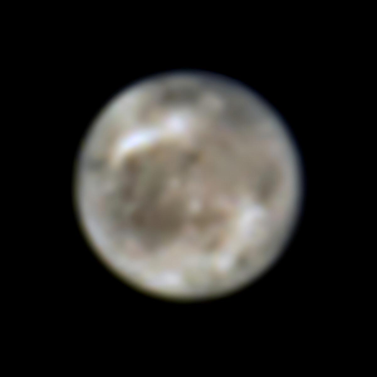 This image shows Jupiter's moon Ganymede as seen by the Hubble Space Telescope in 1996. Ganymede is 800 million km away, and Hubble can track changes on the moon and detect other features at UV and near-infrared wavelengths. Astronomers have now used new data from the Hubble archive to discover for the first time evidence of water vapor in the atmosphere of Jupiter's moon Ganymede. found due to thermal escape of water vapor from ice on the lunar surface Credit: NASA, ESA, John Spencer (SwRI Boulder)