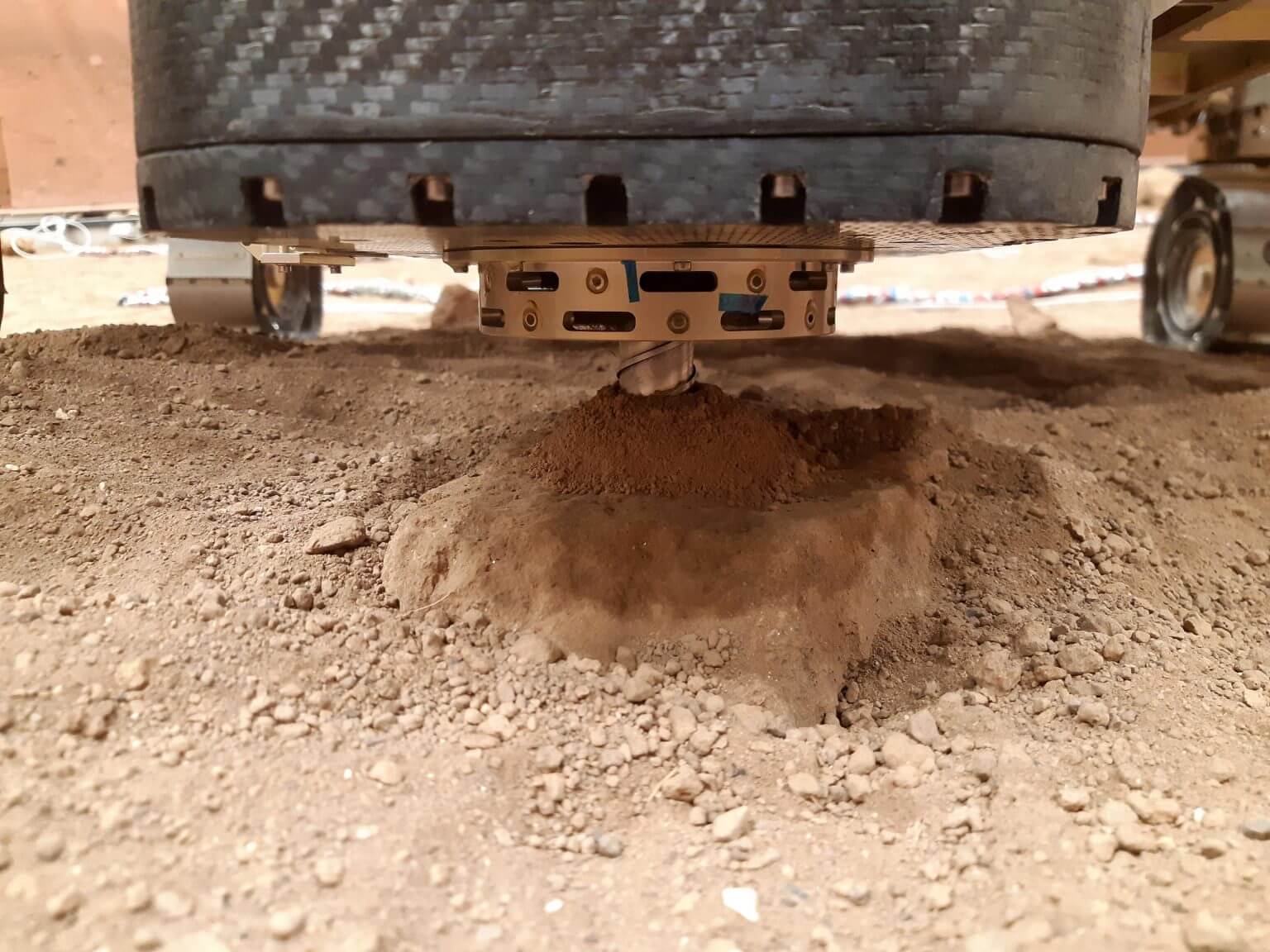 The twin of the European Space Agency's (ESA) Rosalind Franklin rover on Earth drilled and retrieved samples from 1.7 meters deep in the ground -- far deeper than any other Mars rover has ever attempted. Credit: Thales Alenia Space