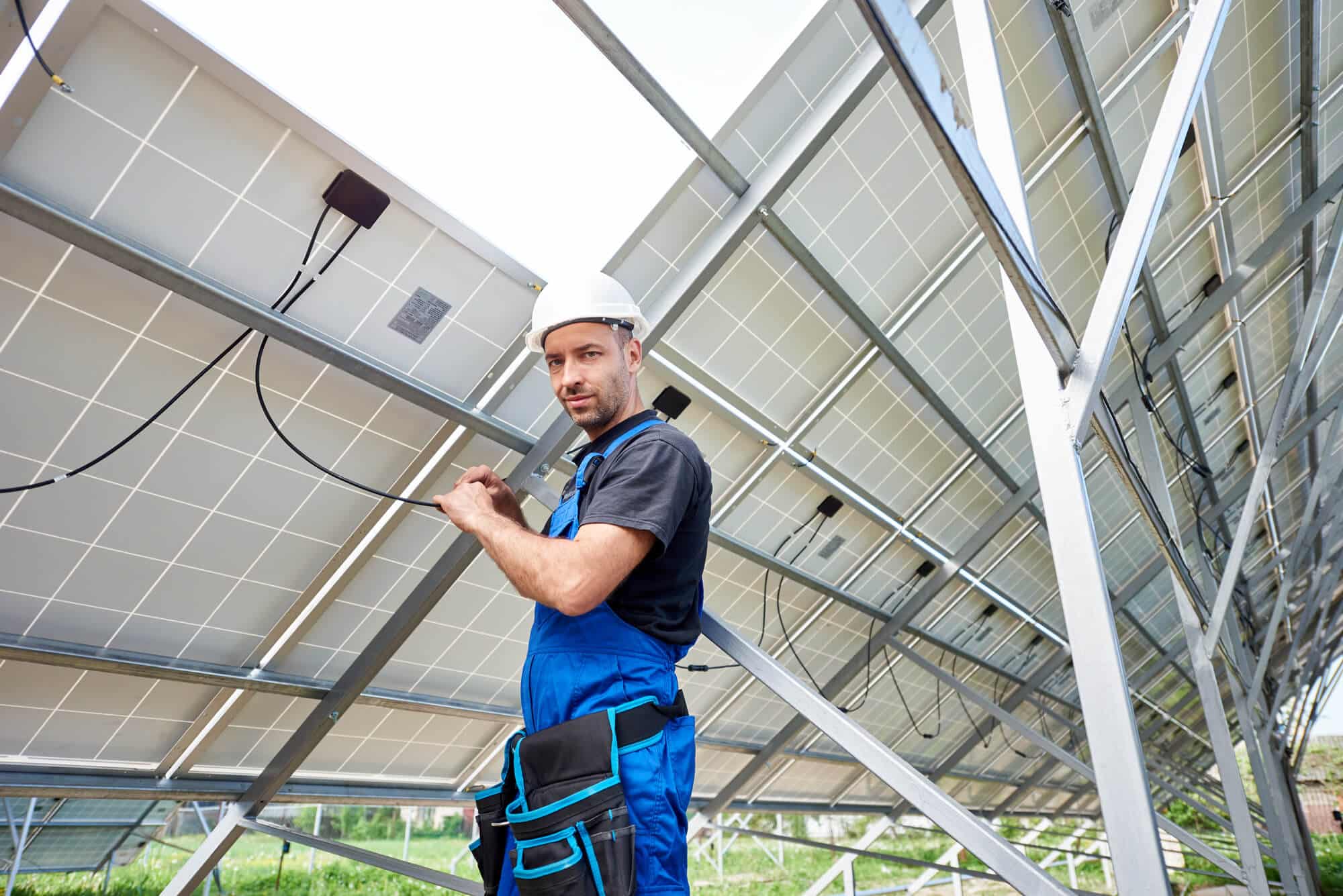 An installer of solar panels in action. Illustration: depositphotos.com