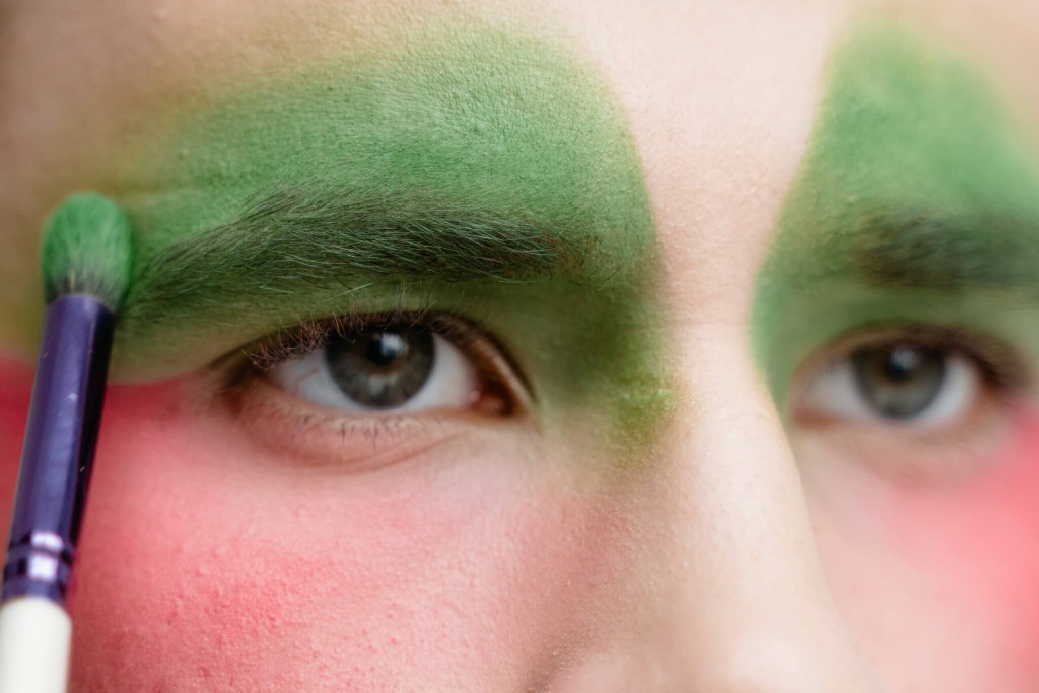 The greenwash is similar to green makeup, like the one used for a formal costume. Photo by MART PRODUCTION on Pexels