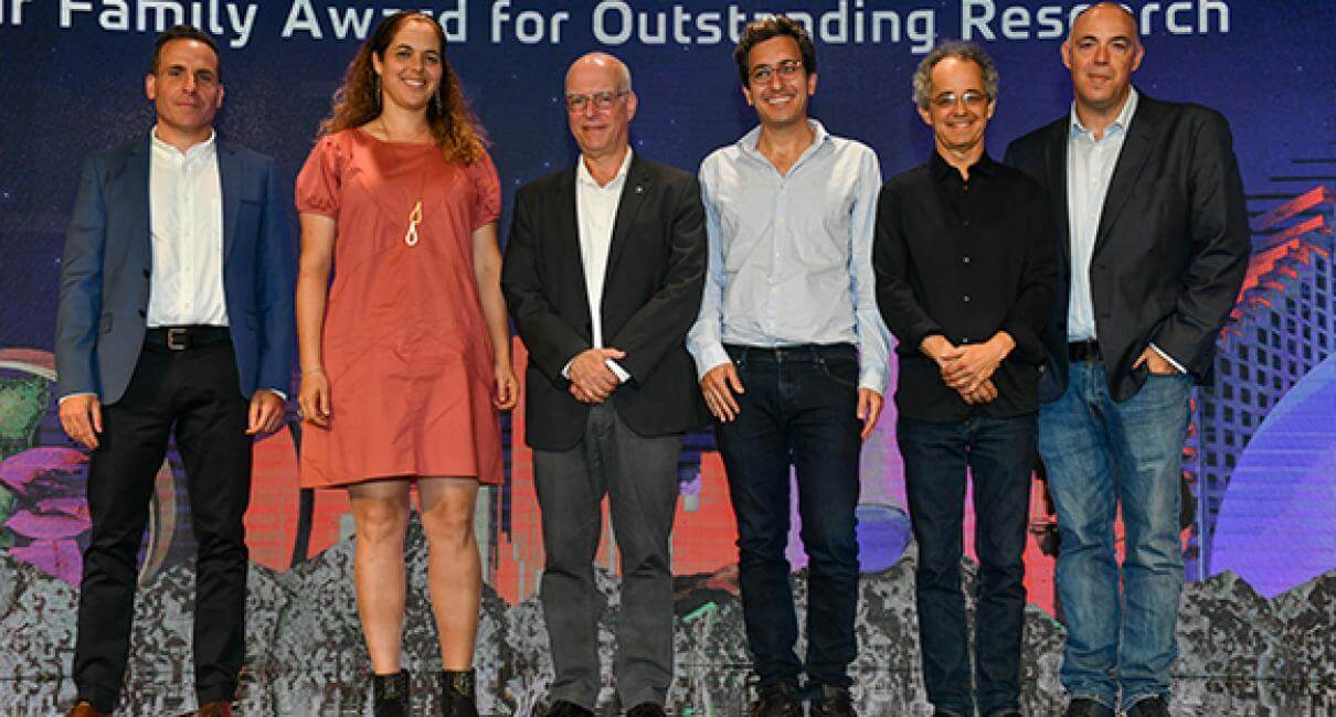 From the right: Prof. Dan Farr, Prof. Leo Kuri, Prof. Jonathan Burnett, Prof. Michal Feldman and Dr. Roi Tzahar