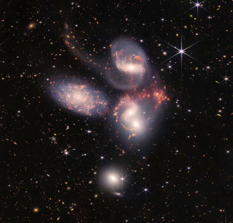 The Stephan V group of galaxies (actually IV) - galaxies caught in a sort of cosmic dance, as imaged by a variety of infrared instruments on the James Webb Space Telescope. Image credit: NASA, ESA, CSA and STScI