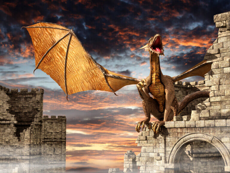 A dragon in the mist hovers over a castle. Image: depositphotos.com