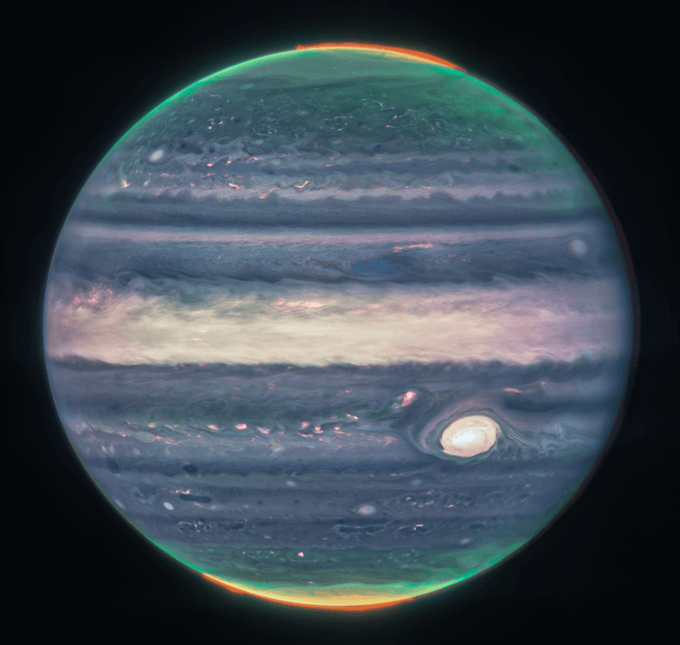 Composite image of Jupiter from three filters – F360M (red), F212N (yellow-green) and F150W2 (blue) – and alignment due to the rotation of the planet. Taken from the NIRCam instrument Credit: NASA, ESA, CSA, Jupiter ERS crew; image processing by Judy Schmidt.