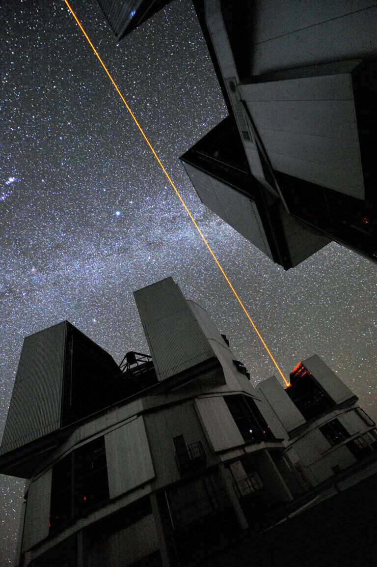 A laser – like the one seen here – or a beam of radio waves deliberately aimed at Earth would be a strong sign of extraterrestrial life. G. Hüdepohl/ESO, CC BY