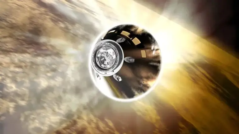 איור של החללית אוריון נכנסת מחדש לאטמוספרה של כדור הארץ. קרדיט: נאס"א