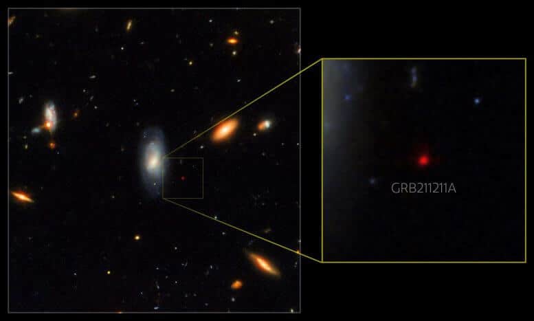 A Hubble Space Telescope view of the location of the gamma-ray burst GRB 211211A and its surroundings.  The frame shows the secondary flash of the eruption, as observed by the Gemini Light Telescope in Hawaii.  The binary system that caused the outburst was probably ejected in the past from the large blue galaxy on the left.Credit: International Gemini Observatory/NOIRLab/NSF/AURA/M.  Zamani;  NASA/ESA