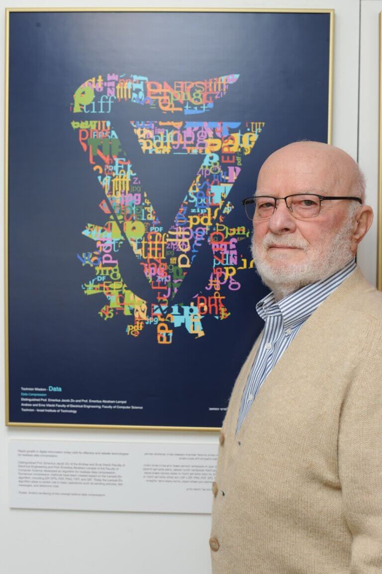 Prof. Avraham Lampel with an illustration describing the Lampel-Ziv algorithm. The illustration was created by artist and curator Anat Har-Gil as part of the "Wisdom of the Technion" exhibition. Photo courtesy of the Technion Spokesperson